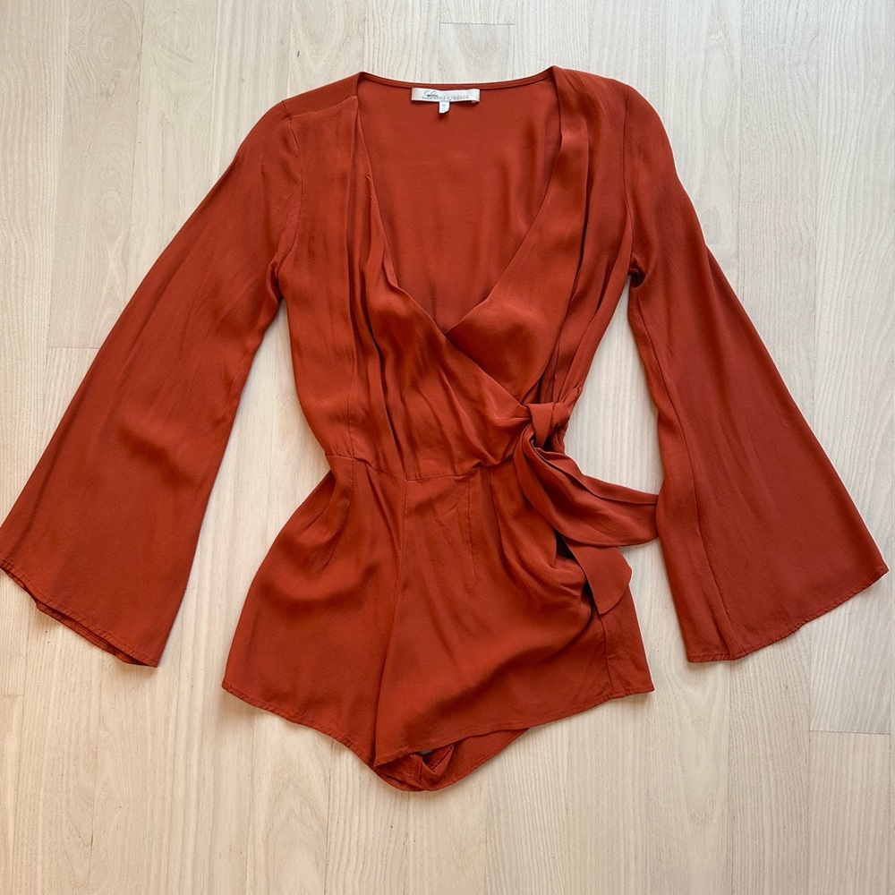 Lovers & Friends Remi romper with bell sleeves and hip tie closure